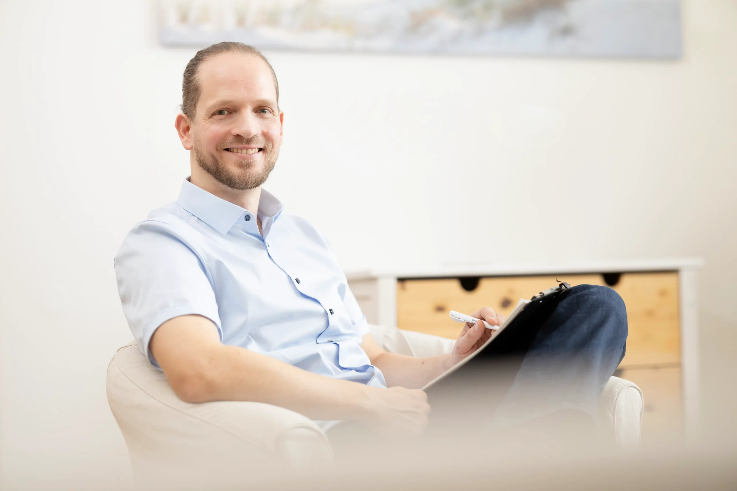 Businessportrait Therapeut im Sessel
